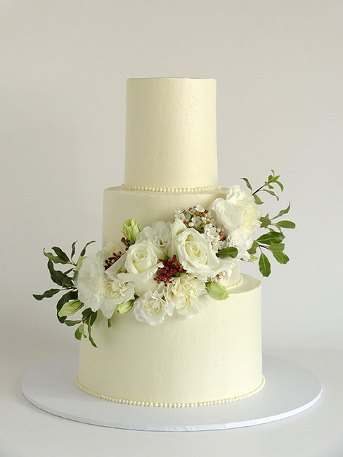 3-tier wedding cake with flowers